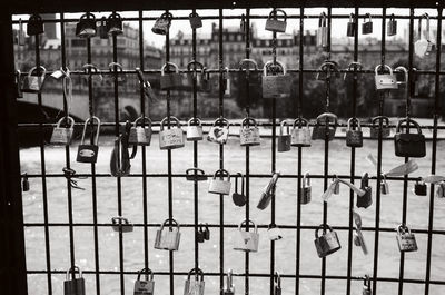 Close-up of padlocks on railing