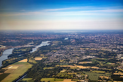 Aerial view of city buildings against sky