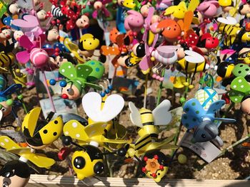 Colorful toys for sale at market stall