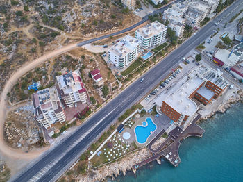 High angle view of swimming pool in city