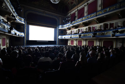 Rear view of people looking at concert