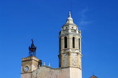 Low angle view of building against blue sky