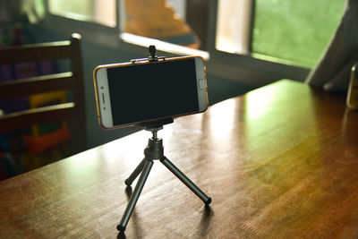 Close-up of smart phone on table