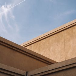 Low angle view of building against blue sky