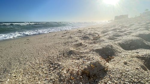 Scenic view of beach against sky