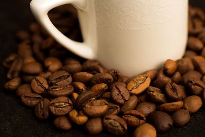 Close-up of coffee beans on table