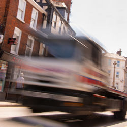 Blurred motion of train in city