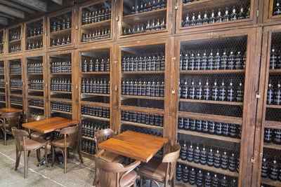 Full frame shot of beer bottles on table