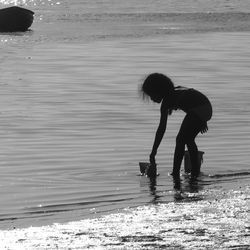 Woman standing at beach