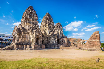 View of rock formations against blue sky