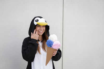 Woman in costume standing outdoors