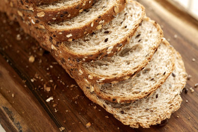 High angle view of bread on cutting board