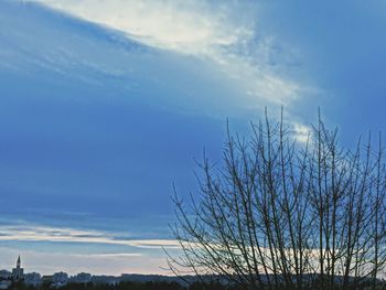 Scenic view of landscape against cloudy sky