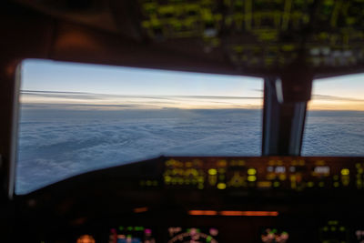 Aerial view of sky seen through airplane window