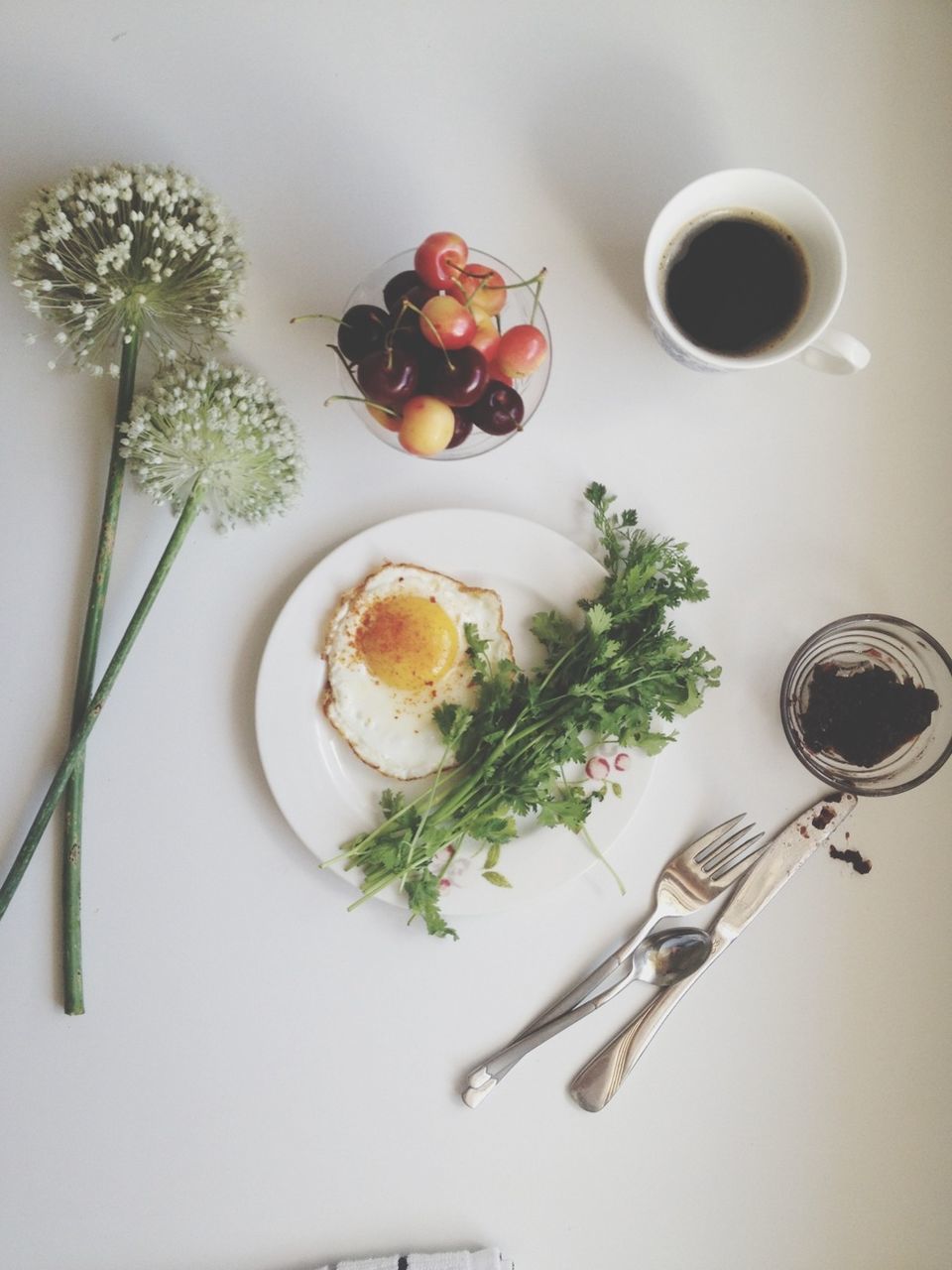 food and drink, indoors, table, freshness, food, still life, healthy eating, plate, high angle view, spoon, bowl, drink, fruit, fork, directly above, coffee cup, refreshment, no people, close-up, cup