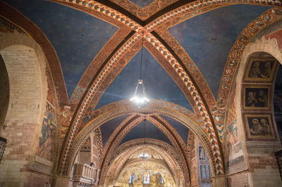 Low angle view of illuminated ceiling of building