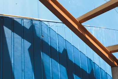 Low angle view of building against blue sky