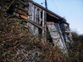 Abandoned building against sky