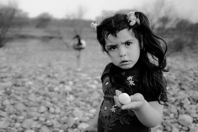 Portrait of girl on field