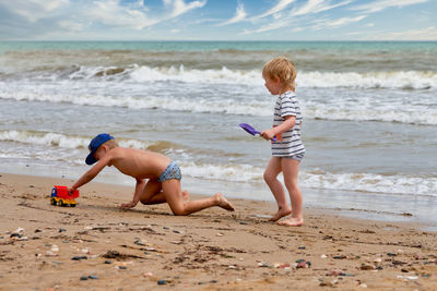 Boy playing on beach