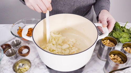 Midsection of woman having food
