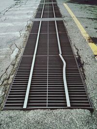 High angle view of sewer amidst street