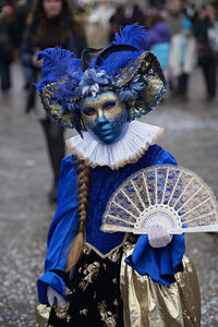 Person wearing blue mask