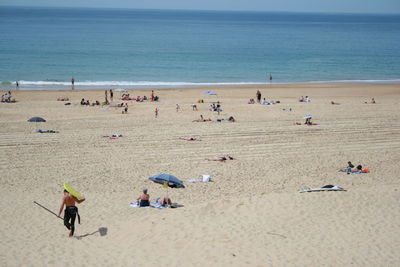 People enjoying at beach