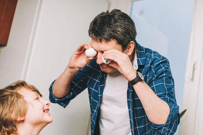 Father and son at home