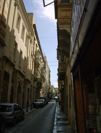 Road in city against sky