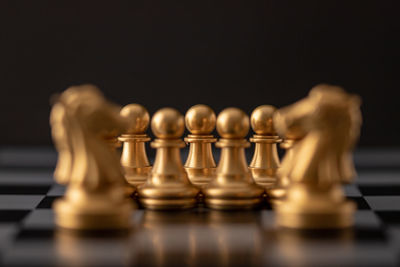 Close-up of chess pieces against blurred background