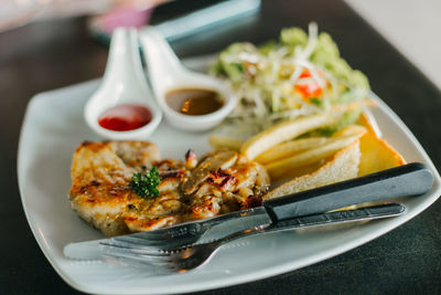 Close-up of food in plate on table