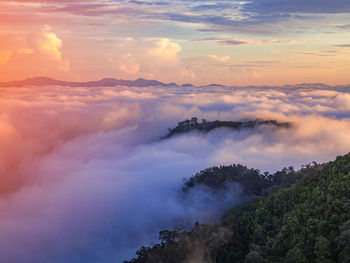 Scenic view of mountains against sky during sunset