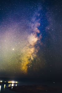 Scenic view of star field against sky at night