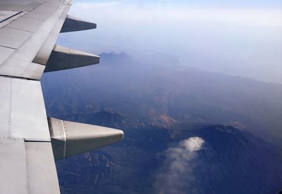 Aerial view of mountains against sky