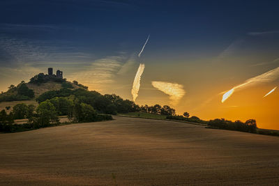 Panoramic view of city against sky during sunset