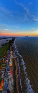 High angle view of sea against sky during sunset