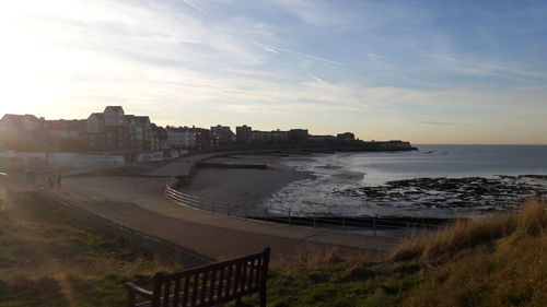 View of beach against sky during sunset