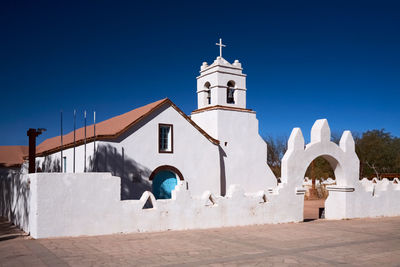 View of traditional building against blue sky