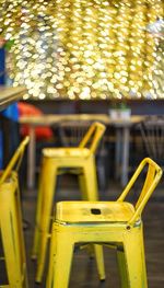 Close-up of yellow chair