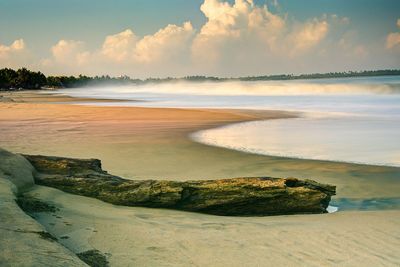 Scenic view of beach against sky