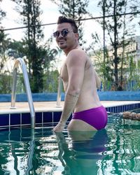 Portrait of smiling man in swimming pool