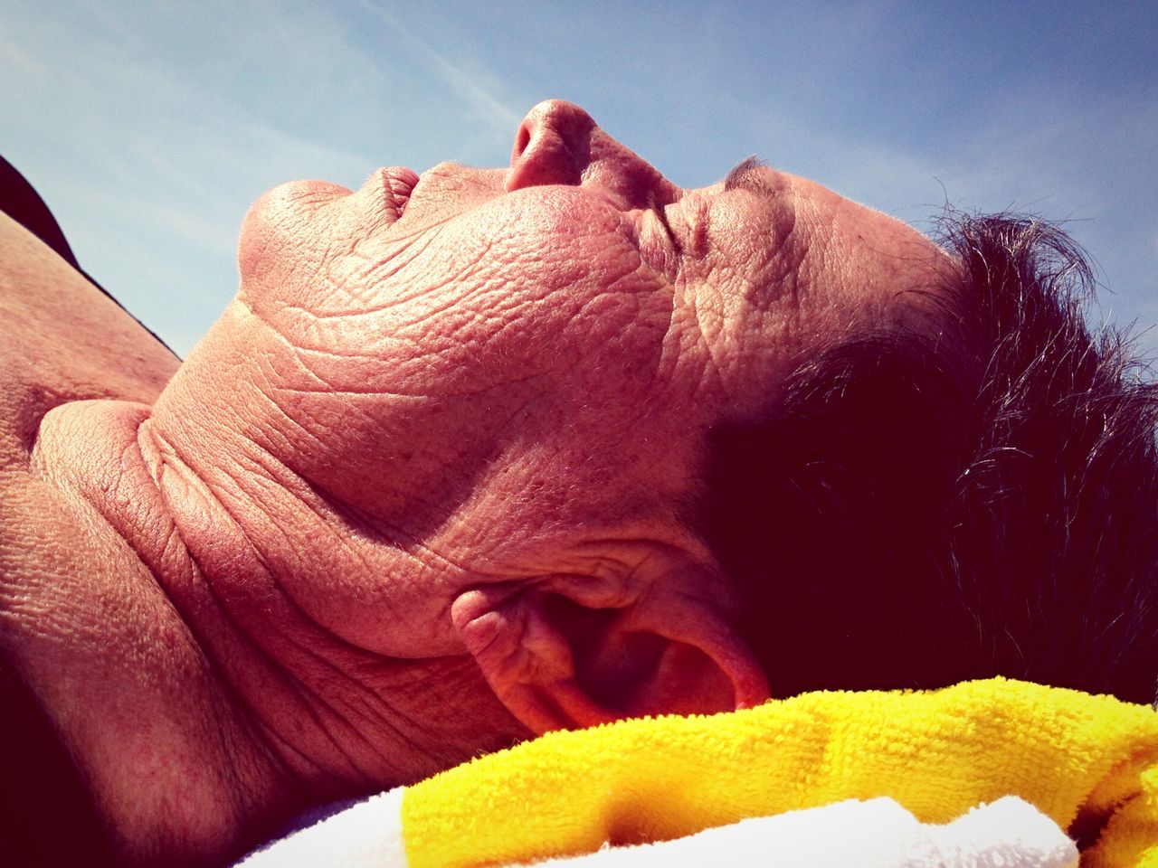 close-up, lifestyles, part of, leisure activity, person, headshot, bonding, love, sunlight, togetherness, men, relaxation, sleeping, sky, cropped, resting, animal themes