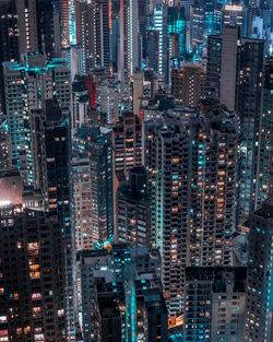 High angle view of illuminated buildings in city