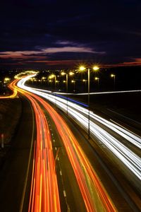 Light trails on road at night