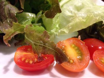 Close-up of served fruits in plate