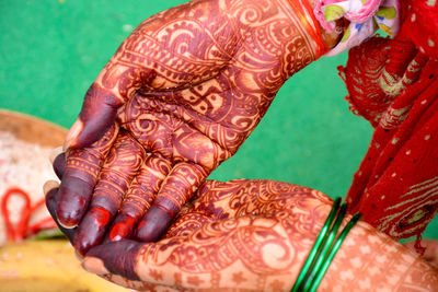 High angle view of human hand on table