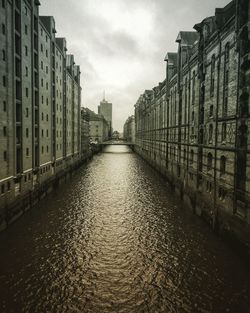 View of city buildings against sky