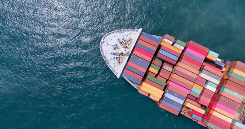 Aerial view of container ship in sea