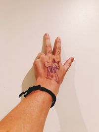 Midsection of man with text against white background